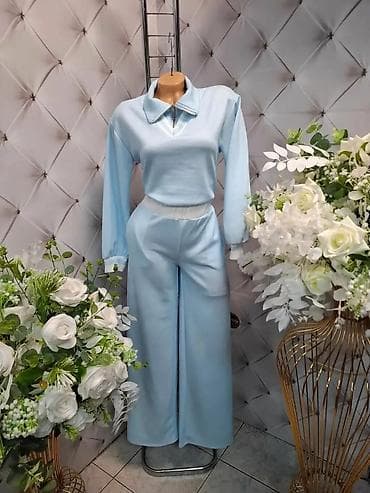 Damski komplet – bluza i pantalone sa širokim nogavicama - Model na lalafo.rs Damski komplet – bluza i pantalone sa širokim nogavicama - Model