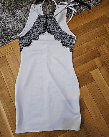 Bela uska haljina bez rukava sa crnom čipkom i ne providi se. - na lalafo.rs Bela uska haljina bez rukava sa crnom čipkom i ne providi se. -