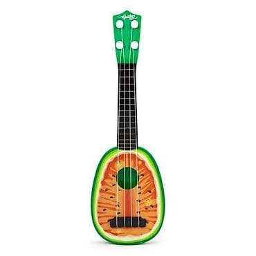 Sopran ukulele sa unikatnim „avokado“ dizajnom na prednjoj ploči. - na lalafo.rs Sopran ukulele sa unikatnim „avokado“ dizajnom na prednjoj ploči. -