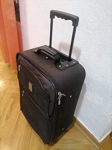 Kofer manji platneni crni na točkiće oko 55 /40 /20 ispravan. BILL na lalafo.rs — 2 Kofer manji platneni crni na točkiće oko 55 /40 /20 ispravan. BILL — 2