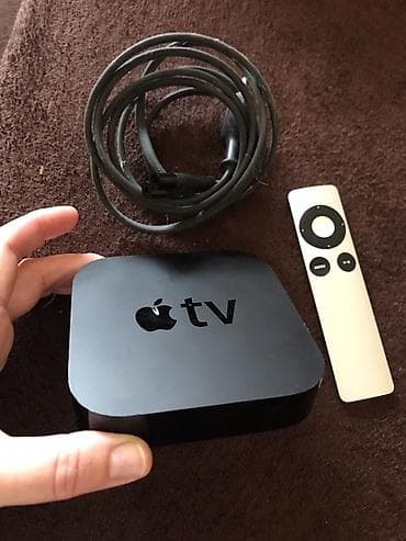 Apple TV (set‑top box) sa daljinskim upravljačem i napojnim kablom. - at lalafo.rs — 1 Apple TV (set‑top box) sa daljinskim upravljačem i napojnim kablom. - — 1