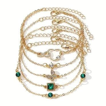 Set od 5 zlatno-toniranih narukvica sa privescima - Materijal: legura na lalafo.rs — 6 Set od 5 zlatno-toniranih narukvica sa privescima - Materijal: legura — 6