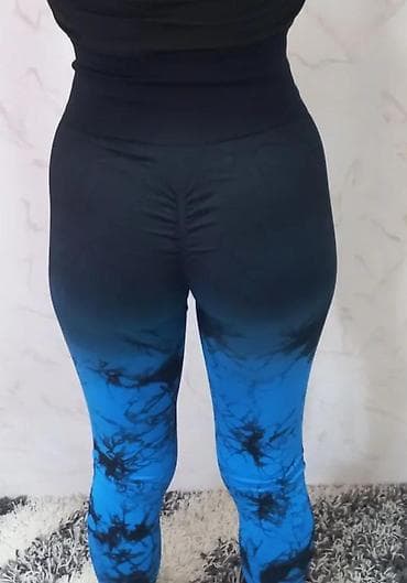 Ženske helanke sa visokim strukom u crno-plavoj tie-dye boji. Helanke na lalafo.rs Ženske helanke sa visokim strukom u crno-plavoj tie-dye boji. Helanke