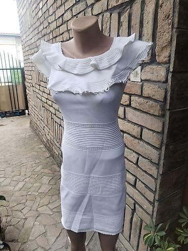 Bela ženska haljina veličine S, sa elegantnim volanima oko dekoltea na lalafo.rs Bela ženska haljina veličine S, sa elegantnim volanima oko dekoltea
