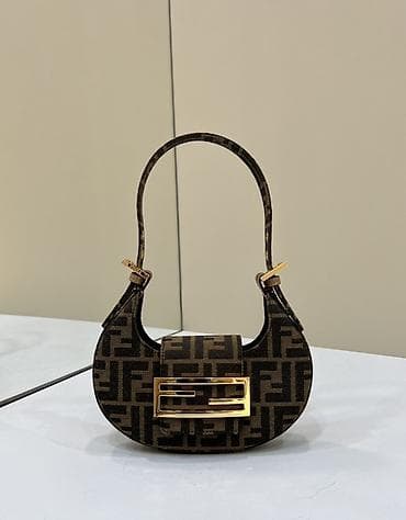 Mini torbica u obliku polumeseca sa monogram printom u smeđim na lalafo.rs — 1 Mini torbica u obliku polumeseca sa monogram printom u smeđim — 1