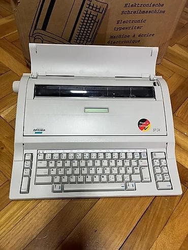 Elektronska pisaća mašina OPTIMA SP 24 (Made in Germany) - na lalafo.rs Elektronska pisaća mašina OPTIMA SP 24 (Made in Germany) -
