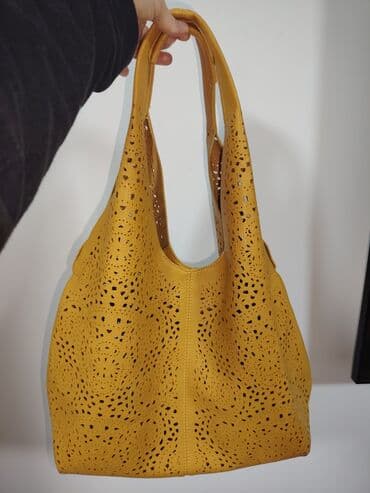 Ženska torba – žuta, perforirani dizajn - Materijal: eko koža sa na lalafo.rs Ženska torba – žuta, perforirani dizajn - Materijal: eko koža sa