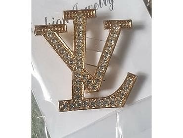 Broš sa cirkonima gucci, chanel, lv louis vuitton. cena 1500 komad na lalafo.rs — 1 Broš sa cirkonima gucci, chanel, lv louis vuitton. cena 1500 komad — 1