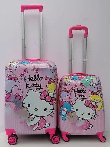 Travel suitcases and bags: Set kofera Hello Kitty – 2 kom - Dizajn: roze sa motivima Hello at lalafo.rs — 2 Travel suitcases and bags: Set kofera Hello Kitty – 2 kom - Dizajn: roze sa motivima Hello — 2