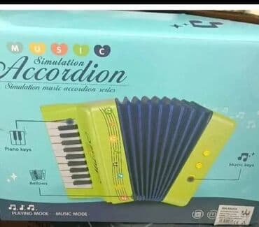Dečiji simulacioni akordeon – muzička igračka - Tip: igračka akordeon na lalafo.rs Dečiji simulacioni akordeon – muzička igračka - Tip: igračka akordeon