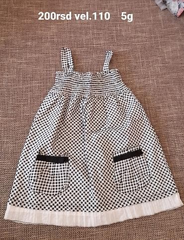 Dečija haljinica na bretele, karirana crno‑bela. Veličina: 110 na lalafo.rs — 1 Dečija haljinica na bretele, karirana crno‑bela. Veličina: 110 — 1