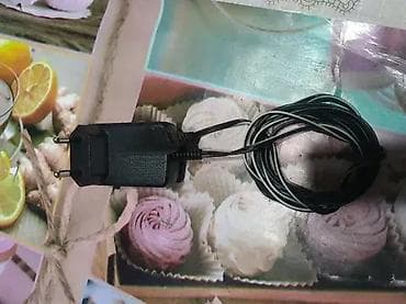 1. Remington PA-0510E 2. Charger Kemei Ac Dc Adaptor Model na lalafo.rs — 7 1. Remington PA-0510E 2. Charger Kemei Ac Dc Adaptor Model — 7