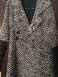 Ženski zimski kaput sa dvorednim kopčanjem i širokim reverima. Tkanina na lalafo.rs Ženski zimski kaput sa dvorednim kopčanjem i širokim reverima. Tkanina