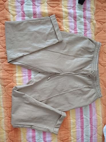 Bež ženske pantalone jogger kroja od eko kože *poobim u struku 50cm - na lalafo.rs Bež ženske pantalone jogger kroja od eko kože *poobim u struku 50cm -
