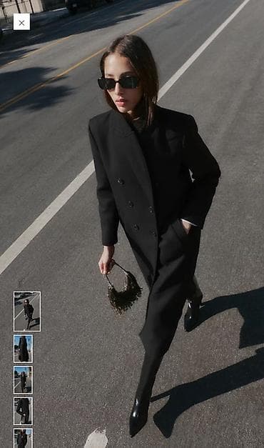 Dugi crni kaput sa dvorednim kopčanjem - Kroj: klasičan, ravan na lalafo.rs Dugi crni kaput sa dvorednim kopčanjem - Kroj: klasičan, ravan