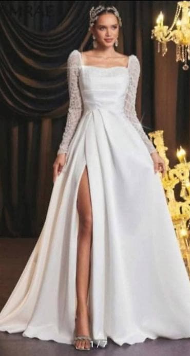 Elegantna duga bela haljina sa kvadratnim izrezom i providnim dugim na lalafo.rs Elegantna duga bela haljina sa kvadratnim izrezom i providnim dugim