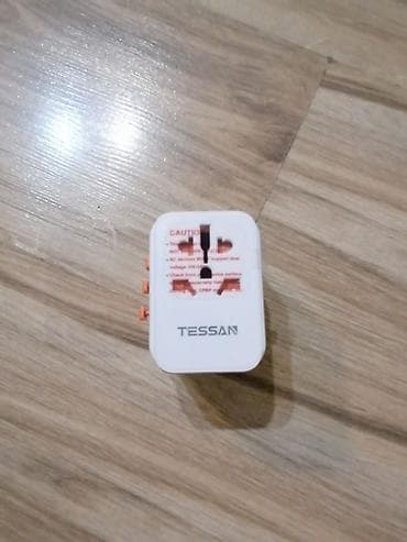 Univerzalni putnički adapter TESSAN - Kompaktan all‑in‑one adapter sa at lalafo.rs — 1 Univerzalni putnički adapter TESSAN - Kompaktan all‑in‑one adapter sa — 1