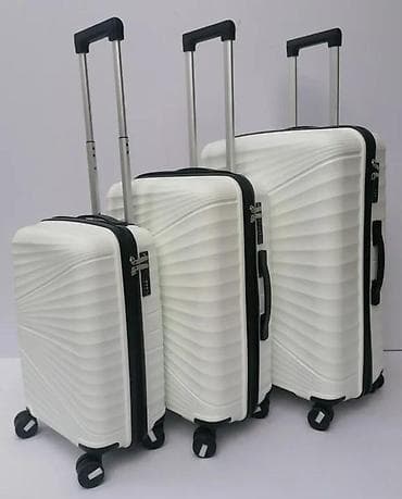 Travel suitcases and bags: === PART 1: TEXTUAL DESCRIPTION === Set od tri bela kofera sa tvrdim at lalafo.rs — 3 Travel suitcases and bags: === PART 1: TEXTUAL DESCRIPTION === Set od tri bela kofera sa tvrdim — 3