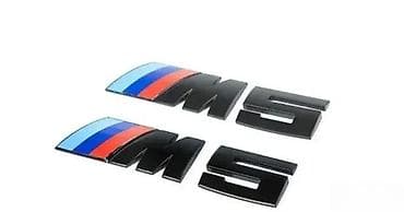 BMW M5 “M” amblem – crna završna obrada, trikolor M pruge na lalafo.rs BMW M5 “M” amblem – crna završna obrada, trikolor M pruge