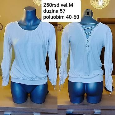 Bela ženska bluza sa dugim rukavima i dekorativnim vezivanjem na na lalafo.rs — 1 Bela ženska bluza sa dugim rukavima i dekorativnim vezivanjem na — 1