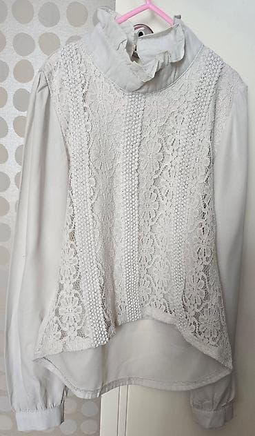 pantalone butiku ali: Bela kosulja bluza, polurolka, napred čipka. Meni super ispod džempera na lalafo.rs — 2 pantalone butiku ali: Bela kosulja bluza, polurolka, napred čipka. Meni super ispod džempera — 2