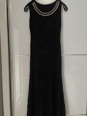 Elegantna crna haljina bez rukava, duga silueta. Gornji deo ima na lalafo.rs Elegantna crna haljina bez rukava, duga silueta. Gornji deo ima