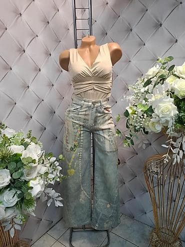 Ženske farmerke širokog kroja sa visokim strukom i ukrasnim printom i na lalafo.rs Ženske farmerke širokog kroja sa visokim strukom i ukrasnim printom i