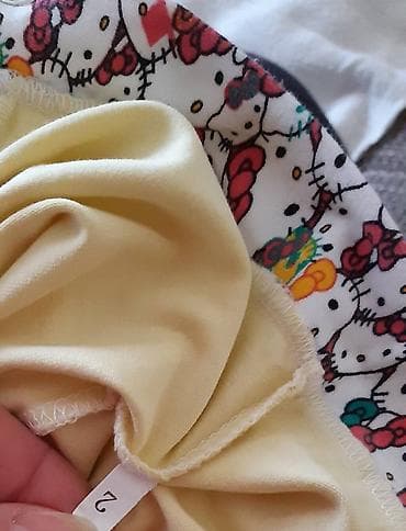 Žuti dečji kratki kombinezon sa kratkim rukavima i printom mačkice sa na lalafo.rs — 2 Žuti dečji kratki kombinezon sa kratkim rukavima i printom mačkice sa — 2