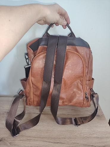 Torba/rančić od eko-kože, toplo braon boje sa tamno braon detaljima at lalafo.rs — 2 Torba/rančić od eko-kože, toplo braon boje sa tamno braon detaljima — 2