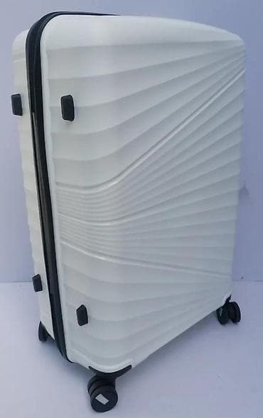 Travel suitcases and bags: === PART 1: TEXTUAL DESCRIPTION === Set od tri bela kofera sa tvrdim at lalafo.rs — 10 Travel suitcases and bags: === PART 1: TEXTUAL DESCRIPTION === Set od tri bela kofera sa tvrdim — 10