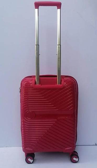 Travel suitcases and bags: Tvrdi kofer na točkiće – ručni kabinski format - Materijal at lalafo.rs — 6 Travel suitcases and bags: Tvrdi kofer na točkiće – ručni kabinski format - Materijal — 6