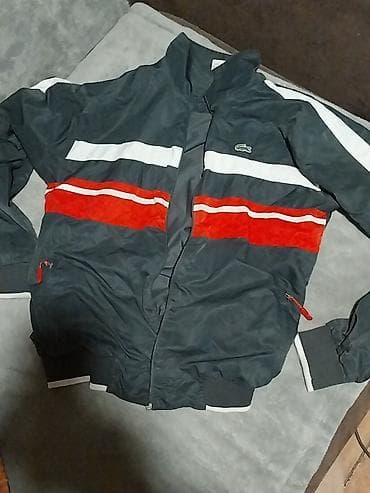 Lacoste muška sportska jakna na rajsferšlus. - Boja: teget sa belim i na lalafo.rs Lacoste muška sportska jakna na rajsferšlus. - Boja: teget sa belim i