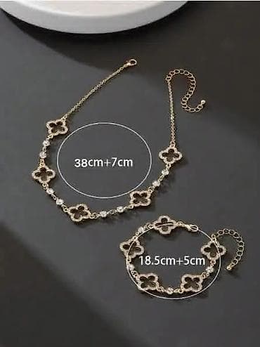 Elegantan set nakita: ogrlica i narukvica u zlatnoj boji sa motivom na lalafo.rs — 1 Elegantan set nakita: ogrlica i narukvica u zlatnoj boji sa motivom — 1