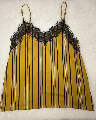 Žuta majica na pruge sa crnom čipkom - Model: slip/komi top na tanke na lalafo.rs Žuta majica na pruge sa crnom čipkom - Model: slip/komi top na tanke