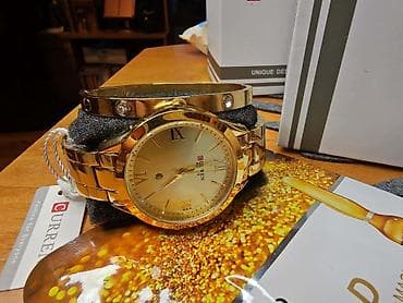 CURREN set – elegantan zlatni ručni sat + narukvica - Brend: CURREN - na lalafo.rs — 2 CURREN set – elegantan zlatni ručni sat + narukvica - Brend: CURREN - — 2