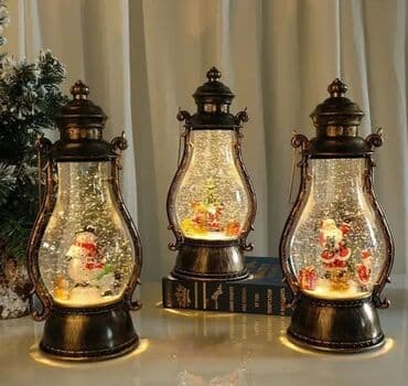 Veliki novogodišnji fenjer sa muzikom i simulacijom snega 🎅✨ Unesite na lalafo.rs Veliki novogodišnji fenjer sa muzikom i simulacijom snega 🎅✨ Unesite