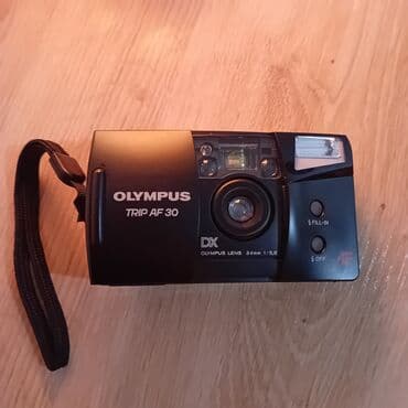Olympus Trip AF 30 – kompaktni 35mm filmski fotoaparat - Objektiv na lalafo.rs Olympus Trip AF 30 – kompaktni 35mm filmski fotoaparat - Objektiv