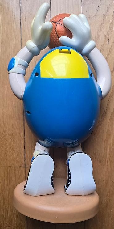 MM - M&M bonbone se ubace, i kad se povuce ruka ispadaju. Igracka na lalafo.rs — 3 MM - M&M bonbone se ubace, i kad se povuce ruka ispadaju. Igracka — 3