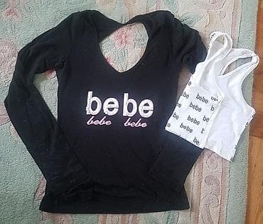 BEBE 2 majice - crna majica otvorenih ledja i bela kao top. Mogu se na lalafo.rs BEBE 2 majice - crna majica otvorenih ledja i bela kao top. Mogu se