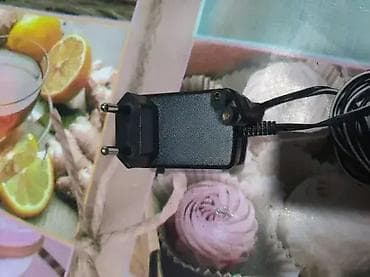 1. Remington PA-0510E 2. Charger Kemei Ac Dc Adaptor Model na lalafo.rs — 4 1. Remington PA-0510E 2. Charger Kemei Ac Dc Adaptor Model — 4