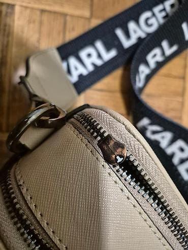 dve suknje po: Ocuvana torbica. nije original. fali da se zameni masinica. ima onaj at lalafo.rs — 3 dve suknje po: Ocuvana torbica. nije original. fali da se zameni masinica. ima onaj — 3