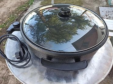 Ironing Boards: Pekač za picu u odličnom stanju, sa termostatom, teflon neoštećen at lalafo.rs — 1 Ironing Boards: Pekač za picu u odličnom stanju, sa termostatom, teflon neoštećen — 1