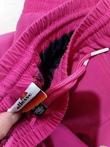 Ellesse ženske trenerke – model sa bočnim prugama - Boja: intenzivno na lalafo.rs — 9 Ellesse ženske trenerke – model sa bočnim prugama - Boja: intenzivno — 9