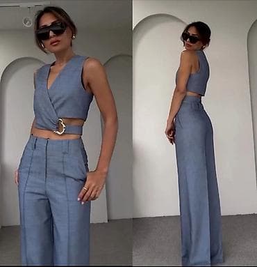 Dvodielni ženski komplet – prsluk/top + pantalone Odgovara veličini m na lalafo.rs — 1 Dvodielni ženski komplet – prsluk/top + pantalone Odgovara veličini m — 1