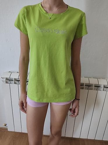 Ženska majica kratkih rukava – Calvin Klein - Model: klasična T‑shirt na lalafo.rs Ženska majica kratkih rukava – Calvin Klein - Model: klasična T‑shirt