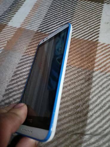 HTC Android pametni telefon u beloj boji sa plavim akcentima. Ovaj na lalafo.rs — 2 HTC Android pametni telefon u beloj boji sa plavim akcentima. Ovaj — 2