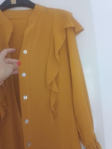 Košulja/bluza u senf boji sa karnerima preko grudi i gumicom oko na lalafo.rs Košulja/bluza u senf boji sa karnerima preko grudi i gumicom oko