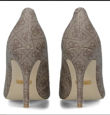 Damske salonke na štiklu sa monogram printom. obuvene jednom - na lalafo.rs — 2 Damske salonke na štiklu sa monogram printom. obuvene jednom - — 2