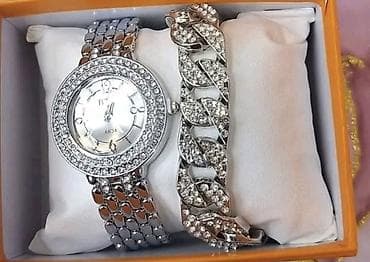 Elegantan set nakita: ženski ručni sat i narukvica u poklon-kutiji. - na lalafo.rs Elegantan set nakita: ženski ručni sat i narukvica u poklon-kutiji. -