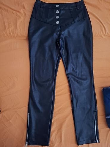 Crne ženske pantalone od eko kože, visokog struka. Prednji deo na lalafo.rs Crne ženske pantalone od eko kože, visokog struka. Prednji deo